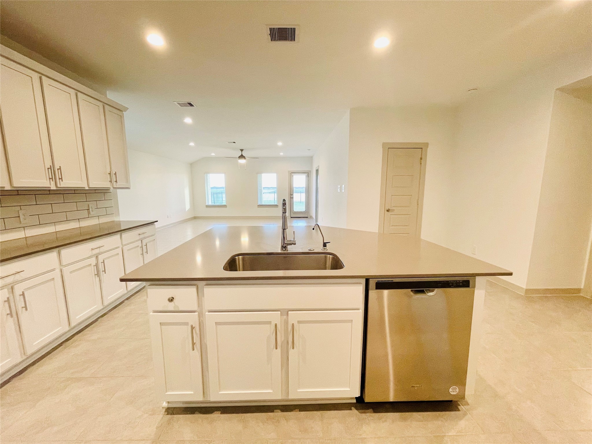 28935 Yachting Point Lane Katy, TX 77494 - Photo 8 of 38 a kitchen with white cabinets