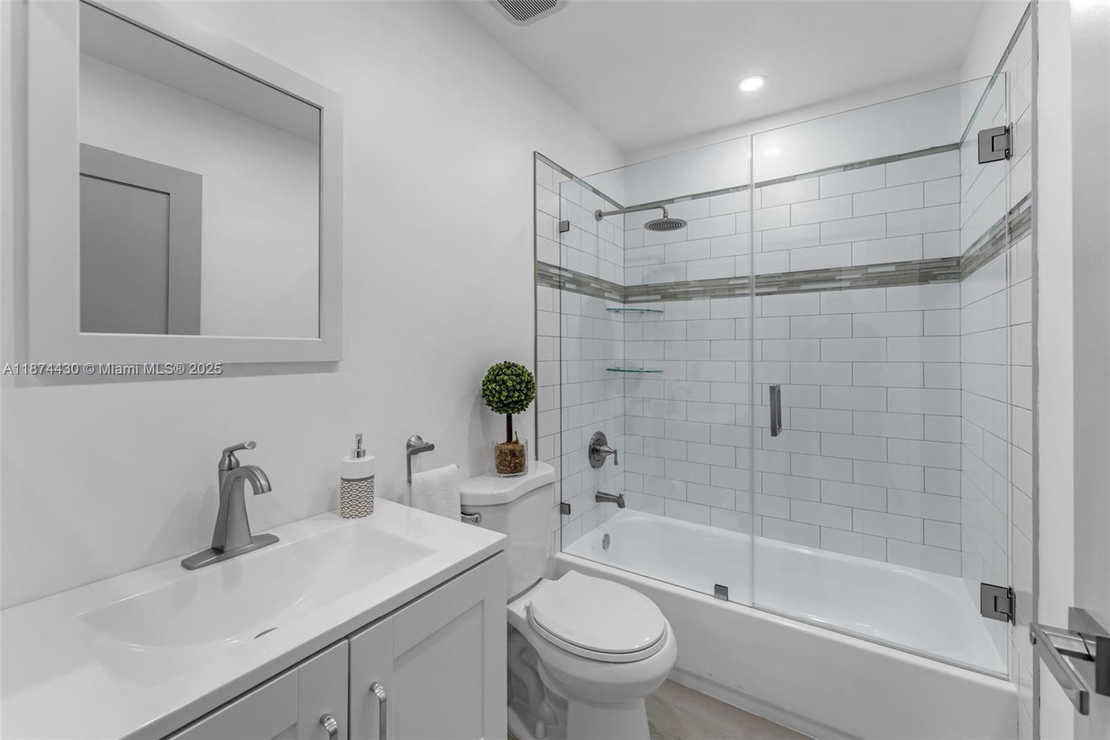 16300 Southwest 102nd Street Miami, FL 33196 - Photo 14 of 40 a bathroom with a sink toilet and shower