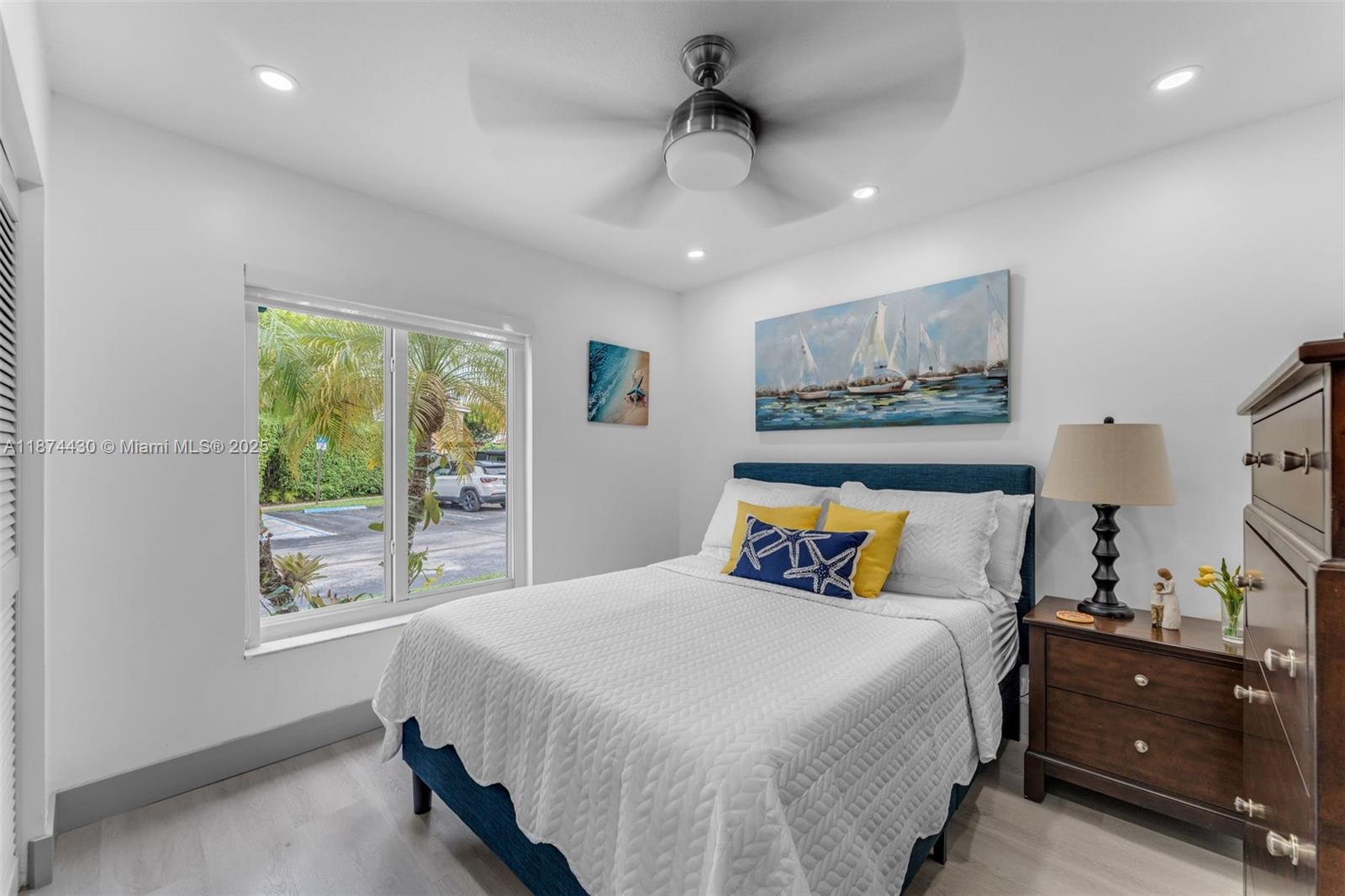 16300 Southwest 102nd Street Miami, FL 33196 - Photo 15 of 40 a bedroom with a bed and a window