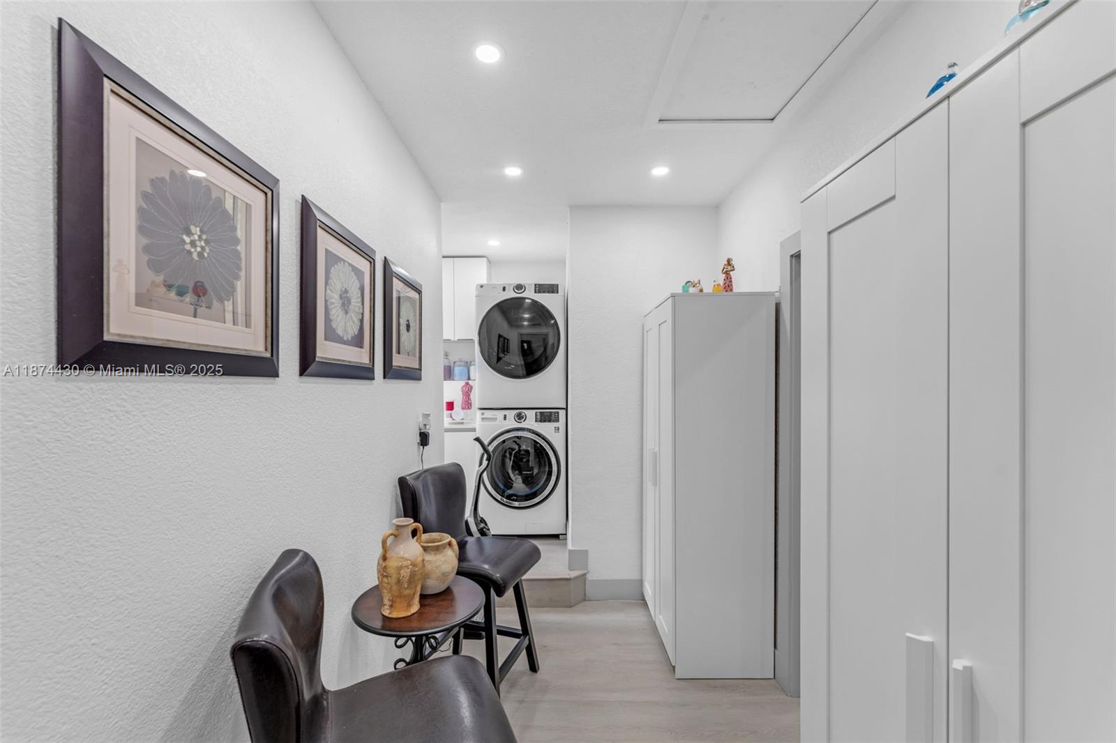 16300 Southwest 102nd Street Miami, FL 33196 - Photo 20 of 40 a view of a hallway with washer and dryer