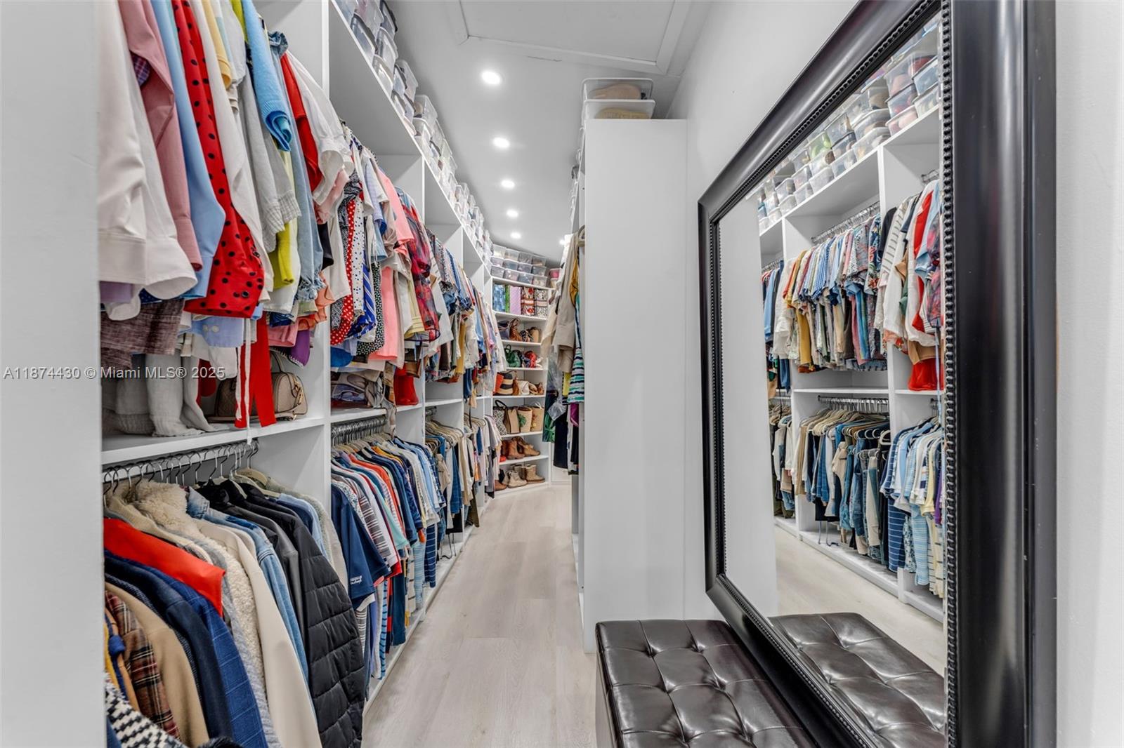 16300 Southwest 102nd Street Miami, FL 33196 - Photo 26 of 40 a view of walk in closet with clothes and shoes