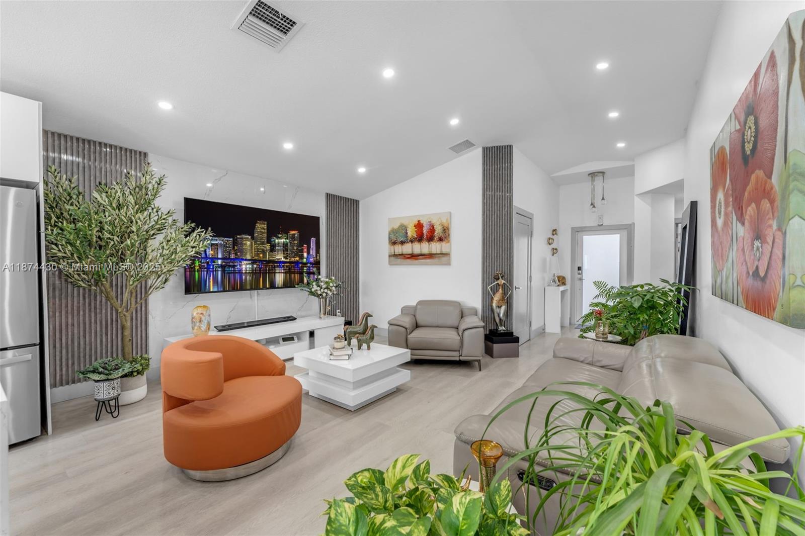 16300 Southwest 102nd Street Miami, FL 33196 - Photo 8 of 40 a living room with furniture and a potted plant