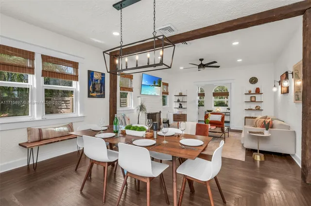 a bedroom with a large bed and a lamp