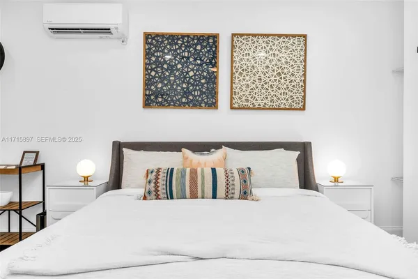 a view of a patio with a table and chairs