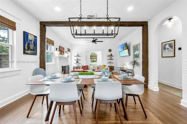 a view of a dining room with furniture window and outside view