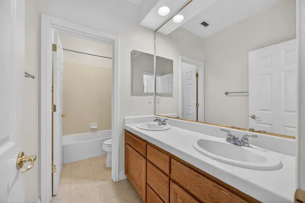 a view of a livingroom with wooden floor and closet