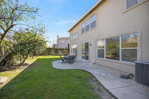 an aerial view of a chairs and table on the terrace