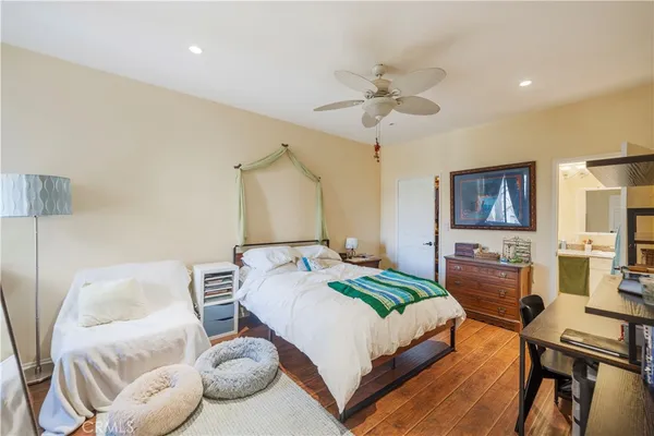 a bedroom with a bed and furniture