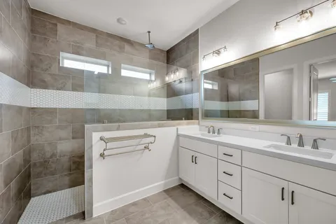 a view of a patio with a table and chairs