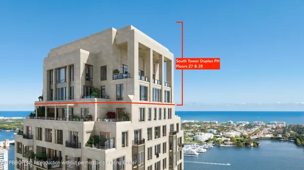 a front view of a building with parking