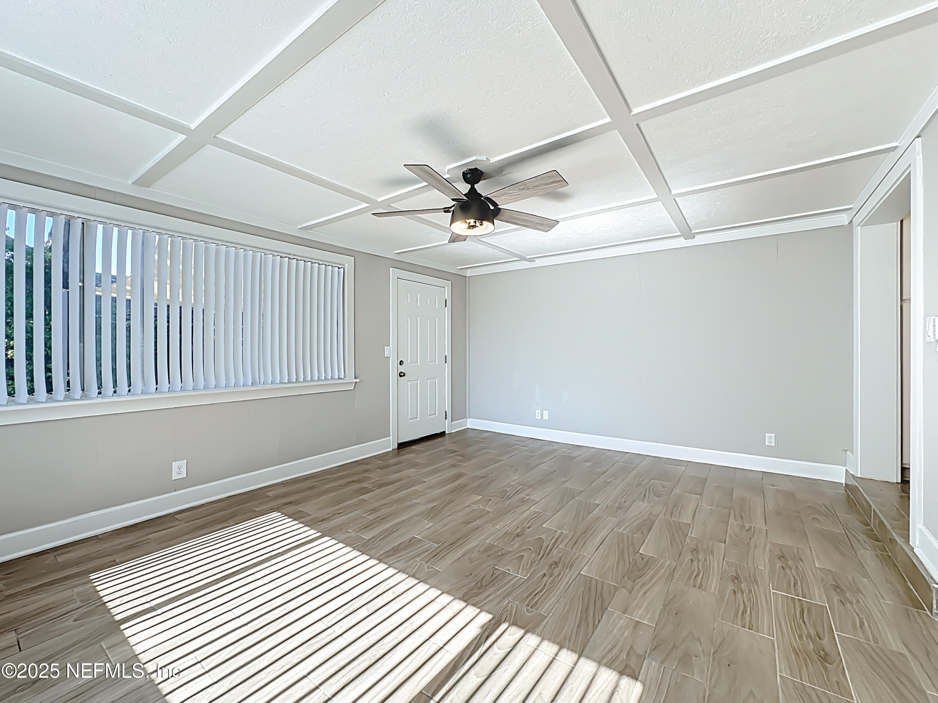 205 Noel Road Orange Park, FL 32073 - Photo 21 of 84 wooden floor in an empty room with a window