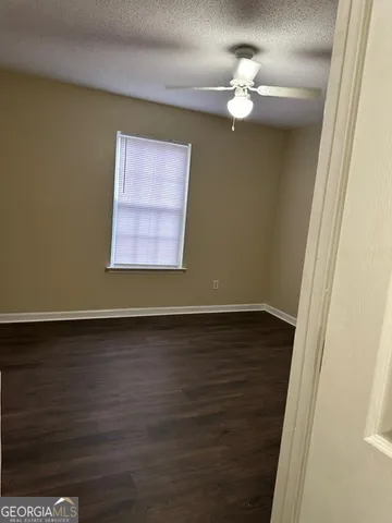 a view of small space with racks on the wall