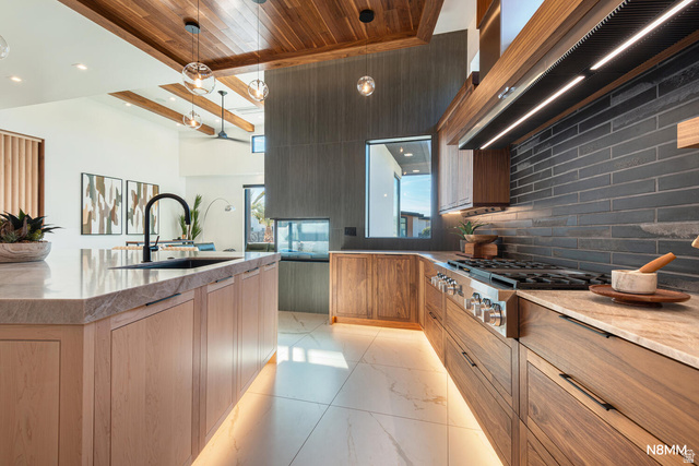 3607 South Cypress Pt Road Hurricane, UT 84737 - Photo 22 of 59 Kitchen with light stone counters, modern cabinets, decorative light fixtures, stainless steel stovetop, and wooden ceiling