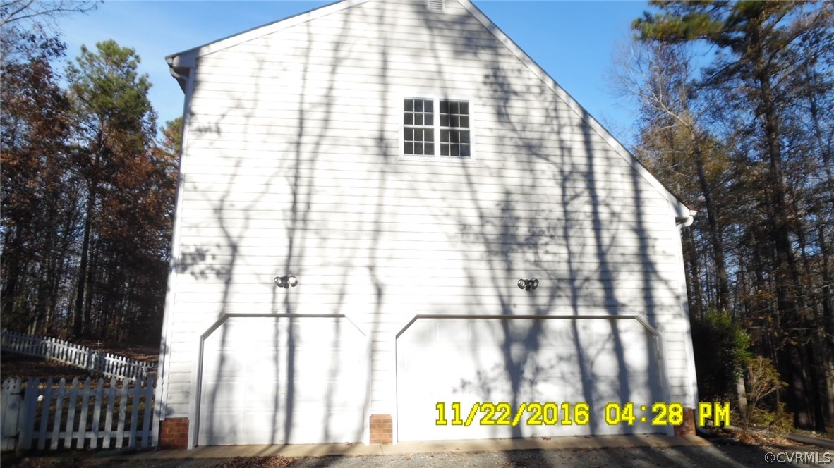 15263 Devonwood Road Montpelier, VA 23192 - Photo 28 of 35 Left Elevation Showing 3+ Car Garage