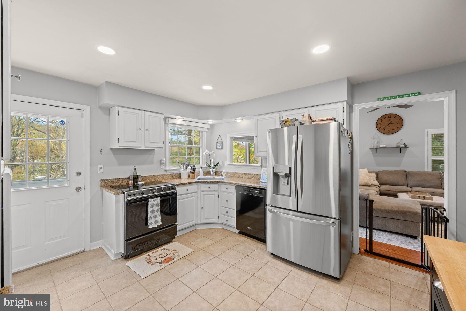 188 Arden Road Conshohocken, PA 19428 - Photo 3 of 39 a kitchen with a refrigerator sink and stove