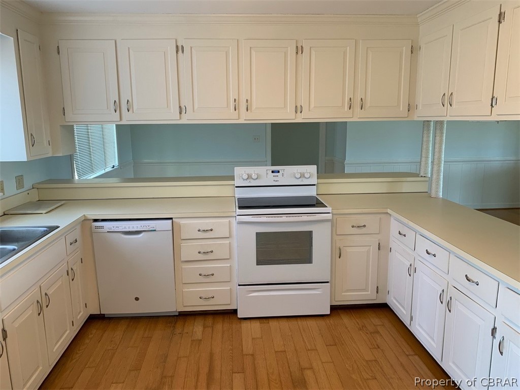 312 Eubank Landing Road Topping, VA 23169 - Photo 3 of 17 Bright, open kitchen with updated appliances, lots of cabinet storage and nice counter space.