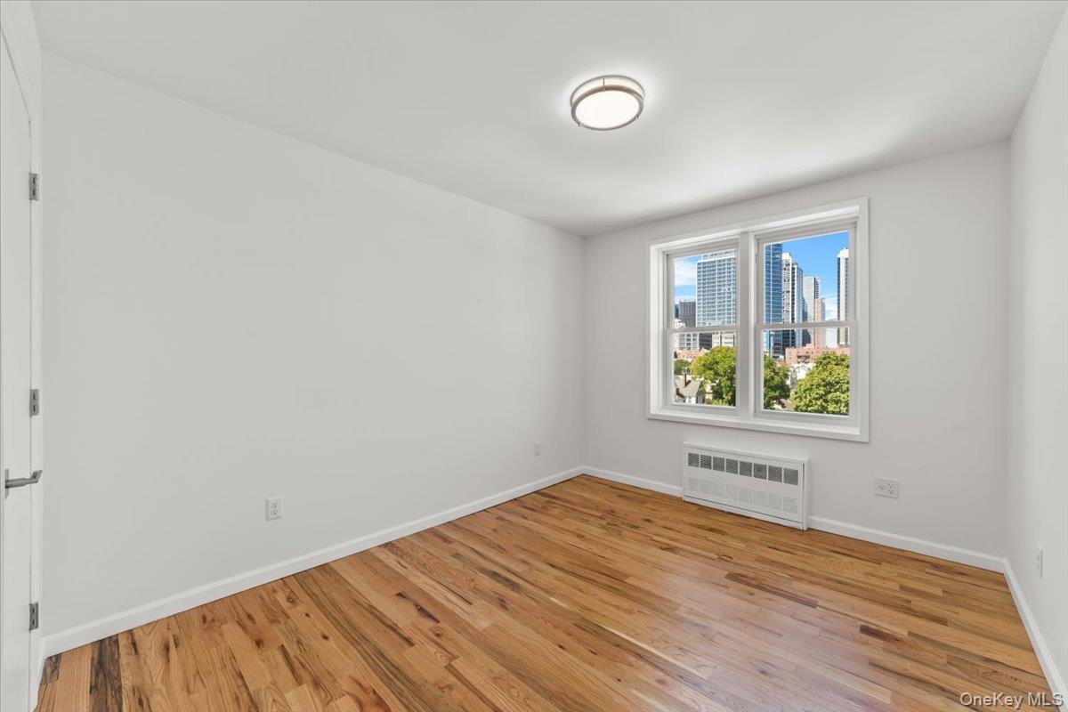 90 Union Street, Unit 6G New Rochelle, NY 10805 - Photo 15 of 20 an empty room with windows