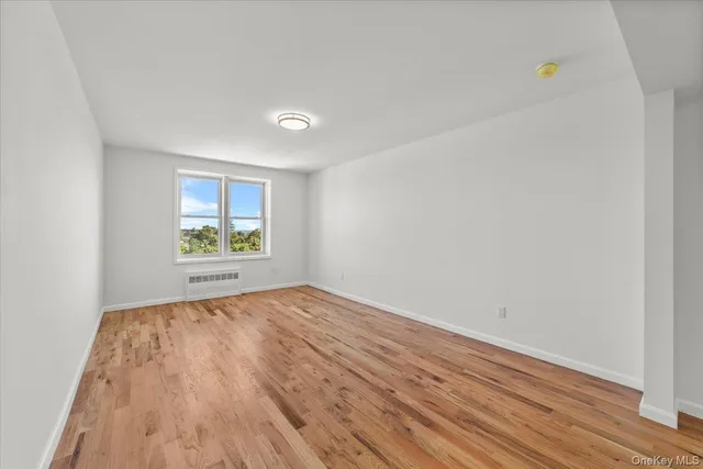 a view of an empty room and window