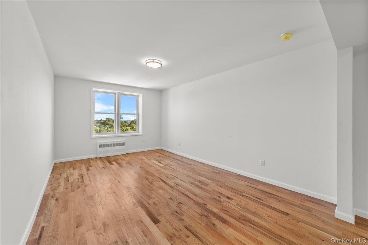 90 Union Street, Unit 6G New Rochelle, NY 10805 - Photo 5 of 20 a view of an empty room and window