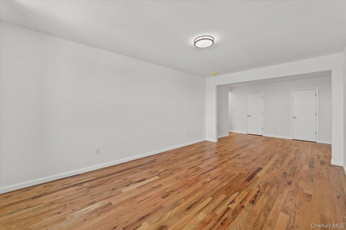 90 Union Street, Unit 6G New Rochelle, NY 10805 - Photo 7 of 20 a view of empty room with wooden floor