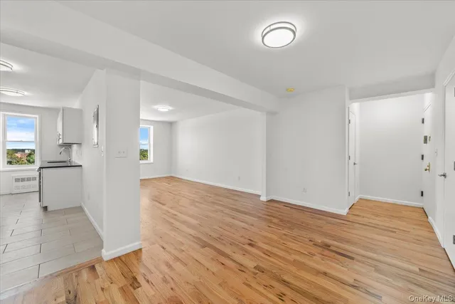 a view of kitchen with wooden floor