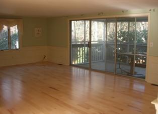 14 Westminster Road Centerville, MA 02632 - Photo 2 of 5 an empty room with wooden floor and windows