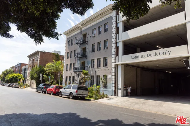 a view of a street with cars