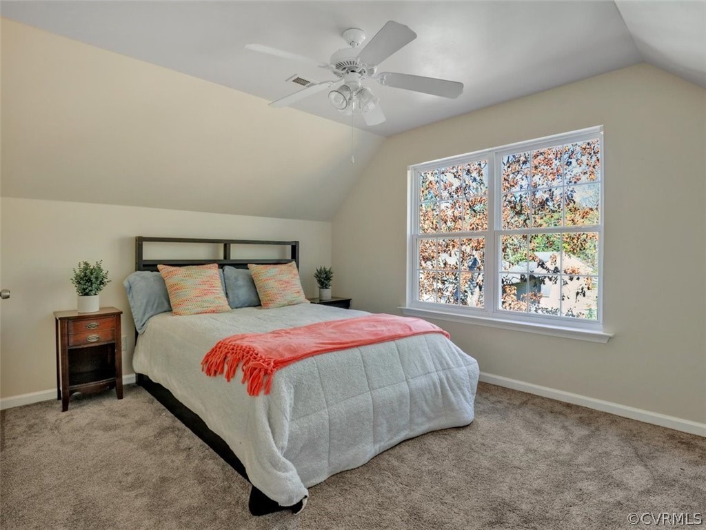 20037 Ivan Road Petersburg, VA 23803 - Photo 35 of 41 a bedroom with a bed and a painting on the wall