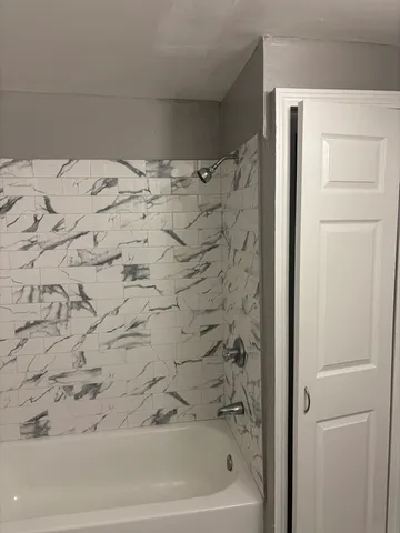 a bathroom with a bathtub