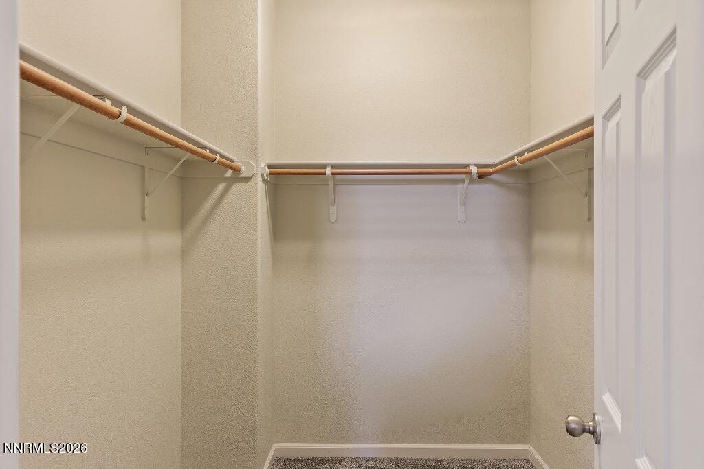 1864 Wind Ranch Road, Unit B Reno, NV 89521 - Photo 23 of 42 a bathroom with a shower