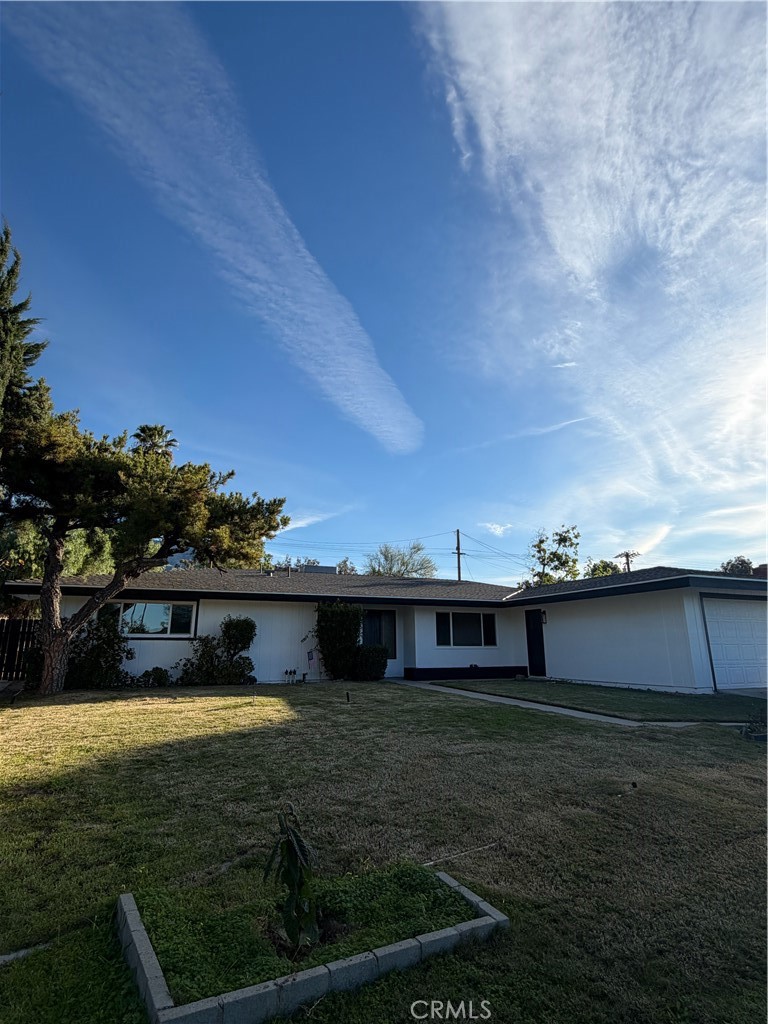 2579 Spring Meadow Lane Highland, CA 92346 - Photo 1 of 17 a view of a big yard with an outdoor space