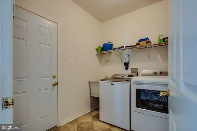 a kitchen with a stove and cabinets