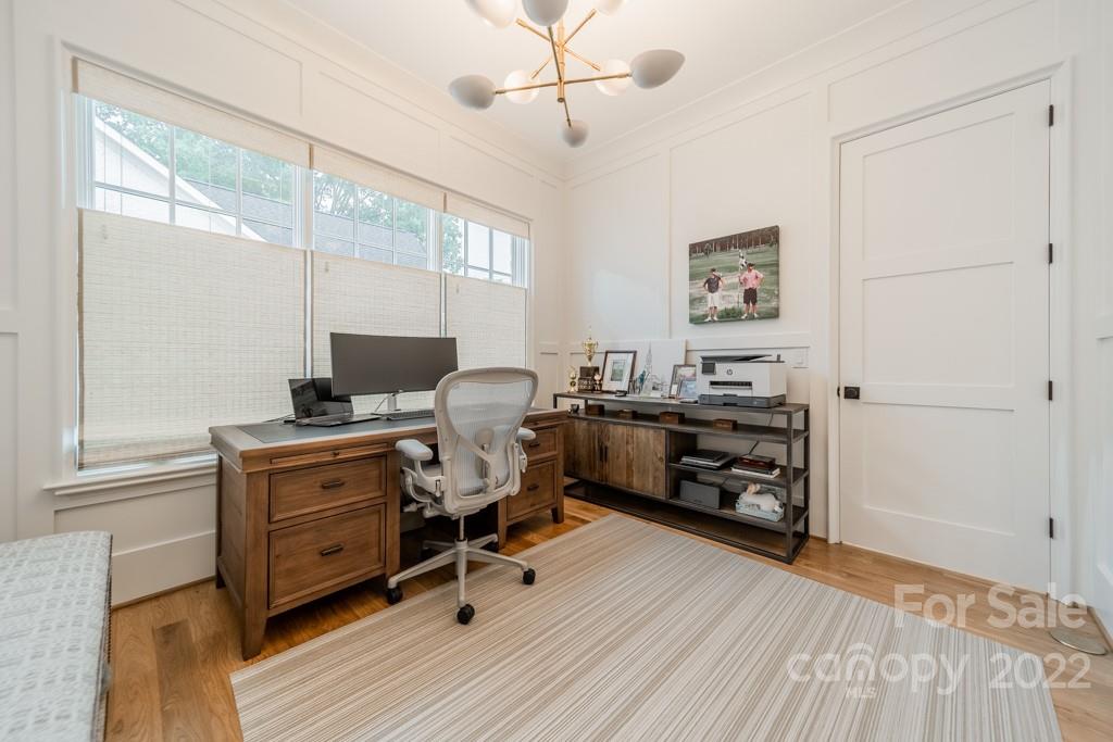 2801 Sharon Road Charlotte, NC 28211 - Photo 6 of 45 a view of a workspace with furniture and a window