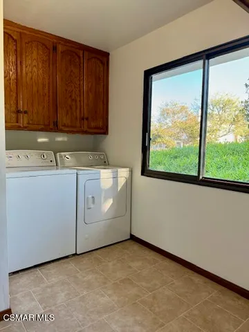 a view of a utility room with washer and dryer