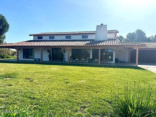a view of a house with a swimming pool