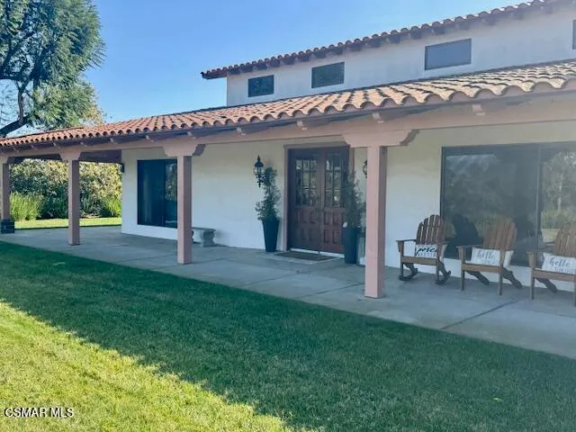 a view of a house with patio