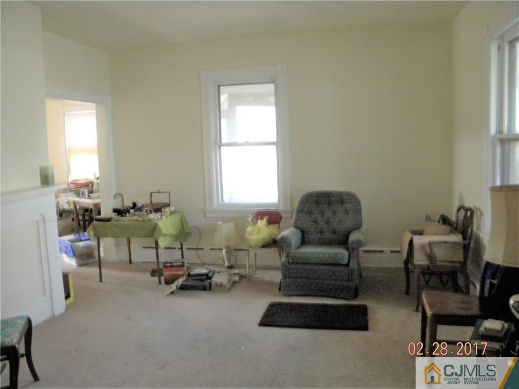 20 3rd Street Somerville, NJ 08876 - Photo 2 of 12 a living room with furniture and a window