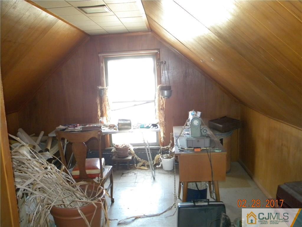 20 3rd Street Somerville, NJ 08876 - Photo 11 of 12 a living room with furniture and a large window
