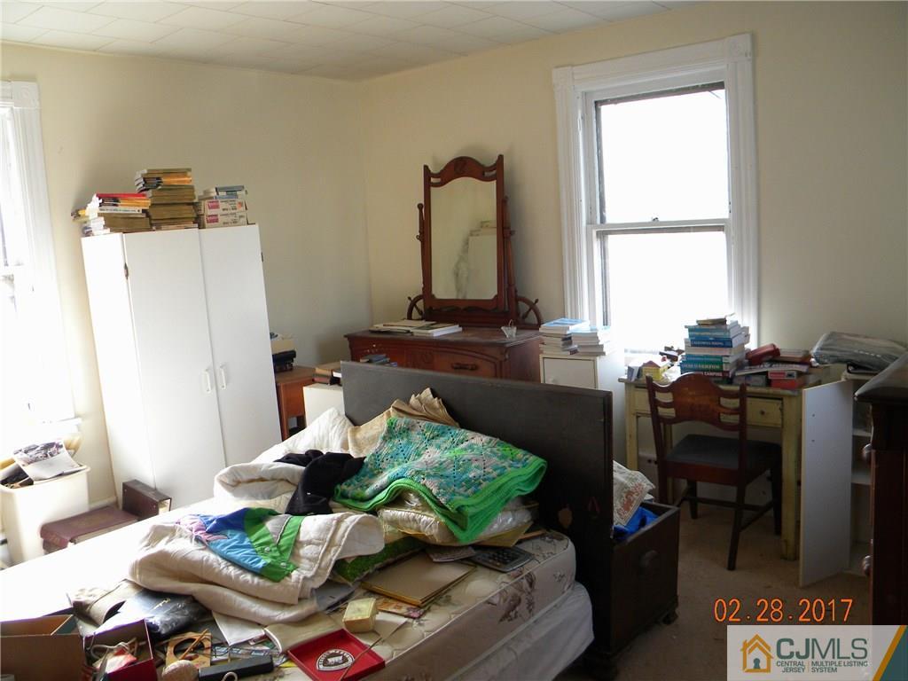 20 3rd Street Somerville, NJ 08876 - Photo 6 of 12 a living room with furniture and a window