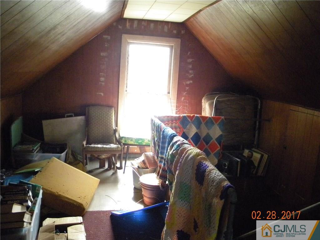 20 3rd Street Somerville, NJ 08876 - Photo 10 of 12 a living room with furniture and a fireplace