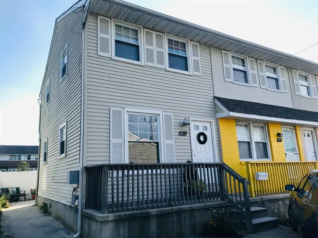 a front view of a house with a porch