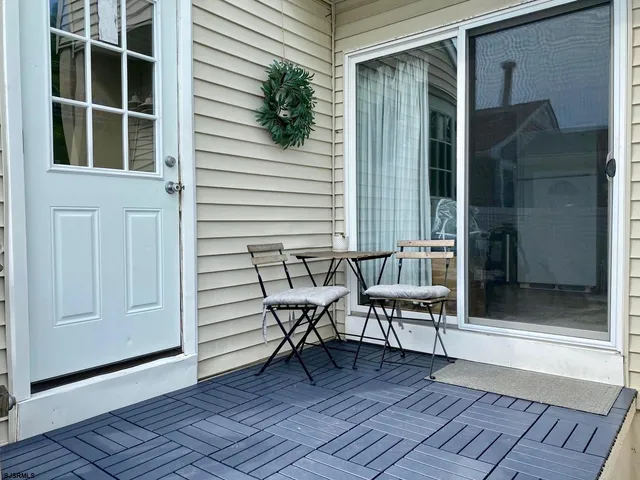 a view of a chairs in front of house
