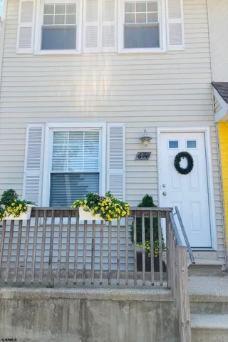 a front view of a house with an outdoor space