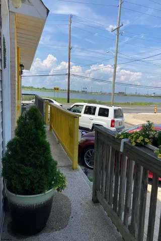 a view of a porch with a yard