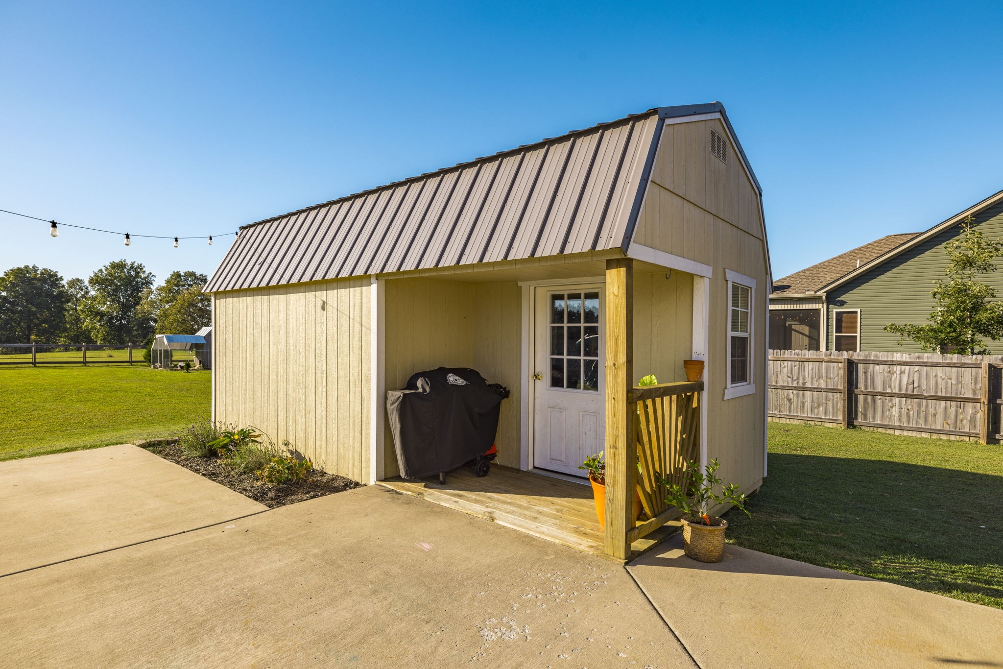 324 East Biggs Road Portland, TN 37148 - Photo 14 of 57 a view of a house with backyard and sitting area