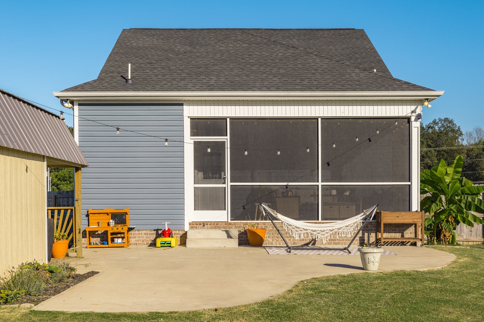 324 East Biggs Road Portland, TN 37148 - Photo 17 of 57 a outdoor space with a couch and chairs