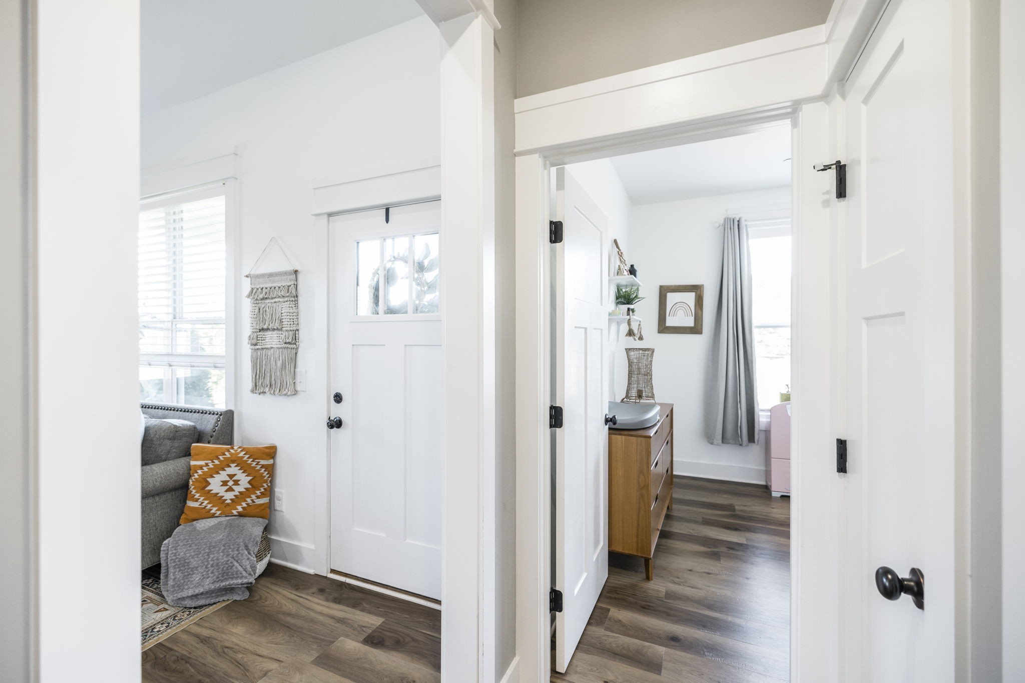324 East Biggs Road Portland, TN 37148 - Photo 26 of 57 a view of a hallway with wooden floor and living room