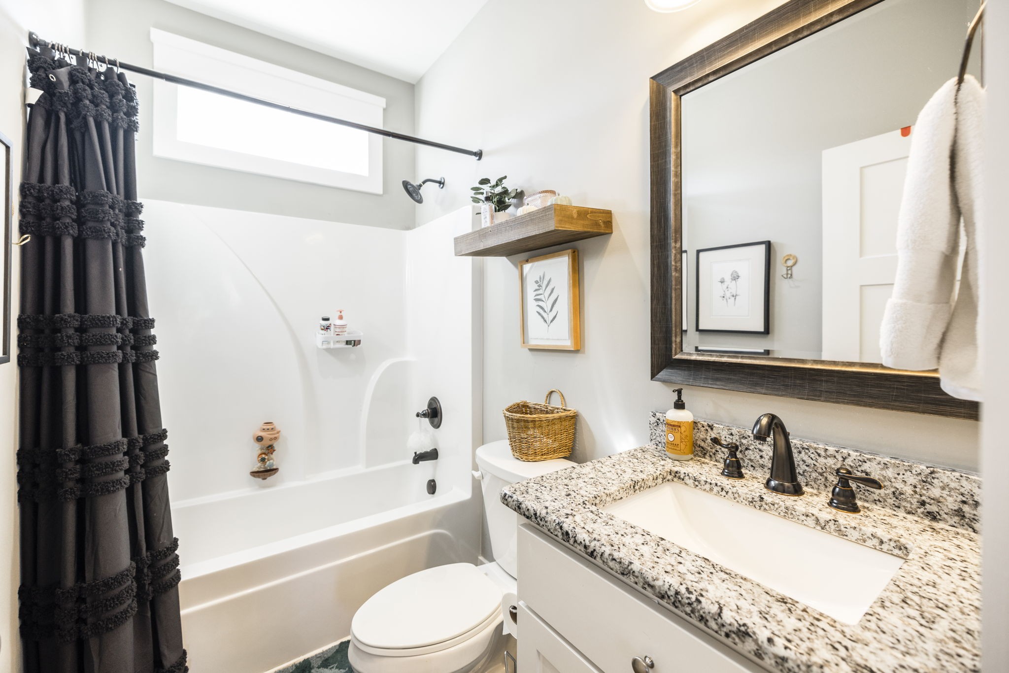 324 East Biggs Road Portland, TN 37148 - Photo 33 of 57 a bathroom with a granite countertop sink toilet and shower