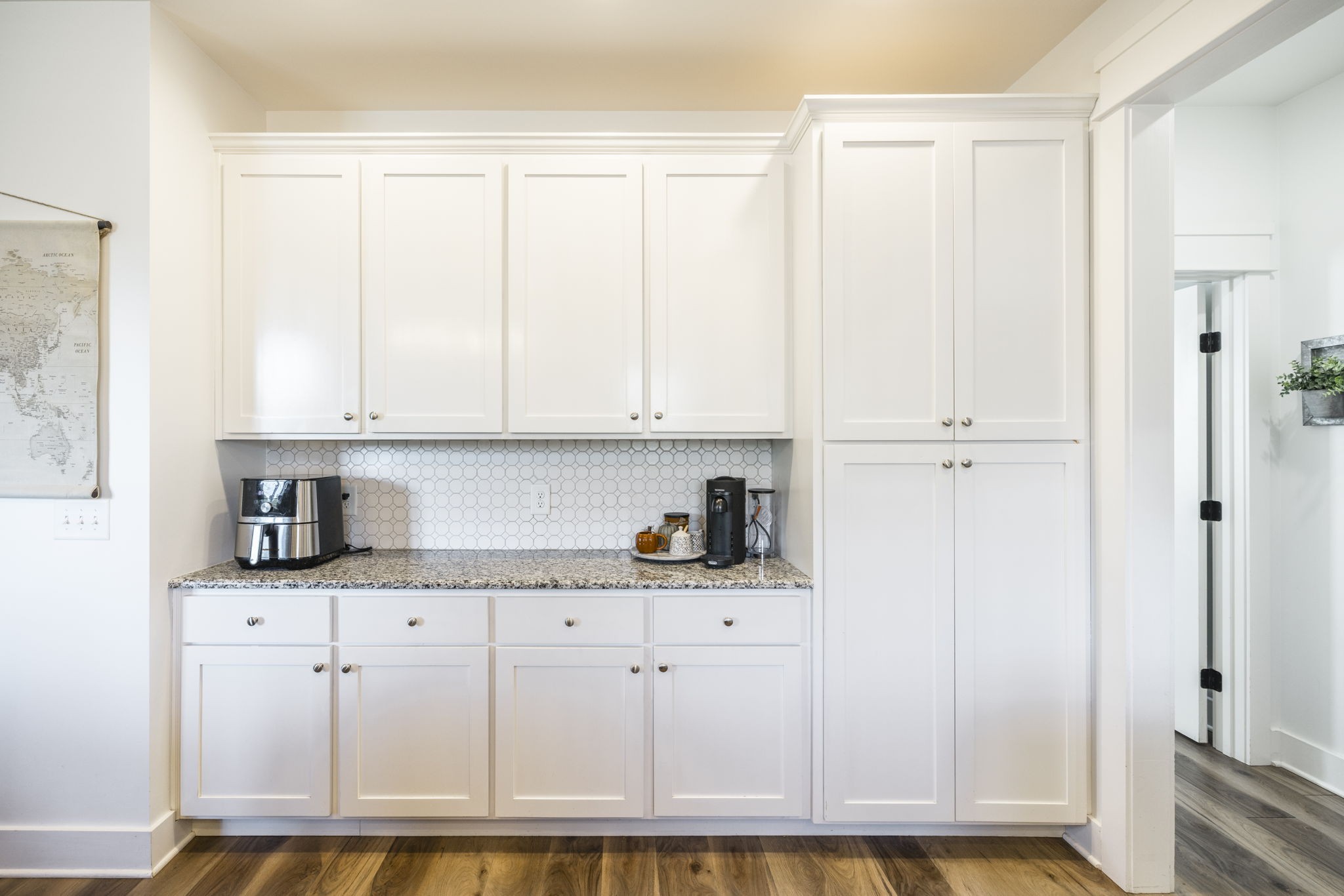 324 East Biggs Road Portland, TN 37148 - Photo 45 of 57 a kitchen with granite countertop white cabinets and sink