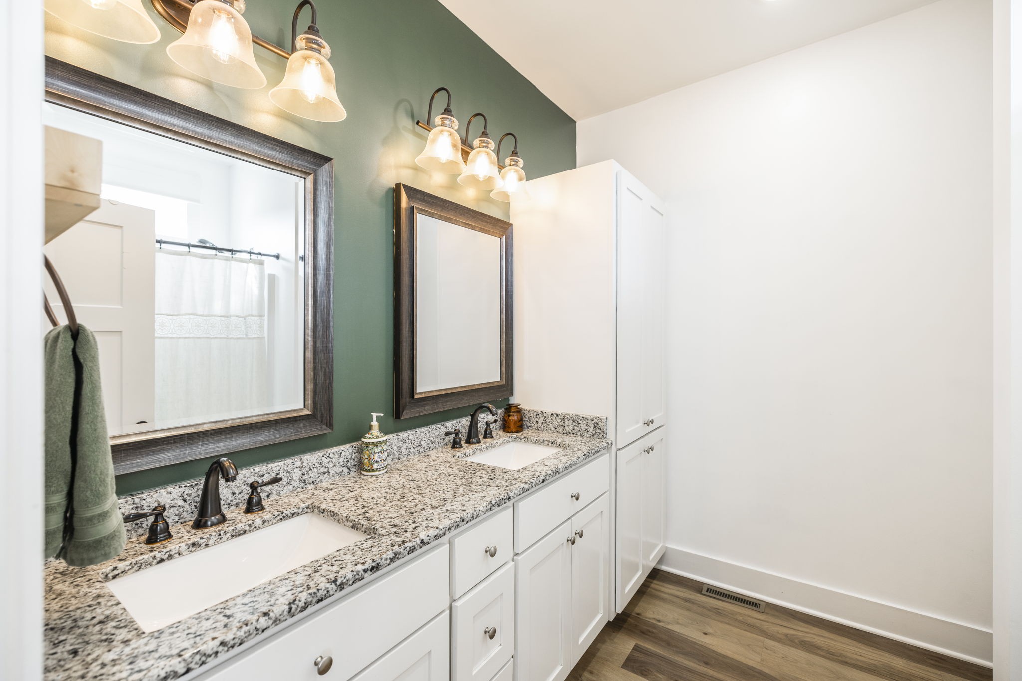 324 East Biggs Road Portland, TN 37148 - Photo 54 of 57 a bathroom with a granite countertop sink and a mirror